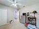 Bedroom with dresser, bookcase and window at 1940 Banner Ln, Saint Cloud, FL 34769