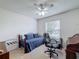 Bedroom with daybed, desk, and window at 1940 Banner Ln, St Cloud, FL 34769