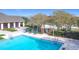 Community pool with lounge chairs and clubhouse nearby at 1940 Banner Ln, St Cloud, FL 34769