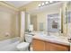 Bathroom with shower/tub combo and light wood vanity at 2101 Bunker View Ct, Kissimmee, FL 34746