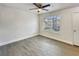 Bright bedroom with grey flooring and large window at 2200 Key West Ct # 722, Kissimmee, FL 34741