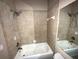 Clean bathroom with bathtub and shower at 2642 Rutledge Ct, Winter Haven, FL 33884