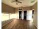 Second bedroom with wood-look flooring and access to another bathroom at 2642 Rutledge Ct, Winter Haven, FL 33884