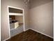 Cozy dining area with wood flooring and a view into the kitchen at 2642 Rutledge Ct, Winter Haven, FL 33884