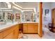 Primary bathroom with dual sinks and corner vanity at 2801 S Granada Blvd, Kissimmee, FL 34746