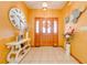 Inviting entryway with tiled floors and an oversized clock at 2801 S Granada Blvd, Kissimmee, FL 34746