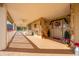 Covered front porch with stone exterior and a welcoming entrance at 2801 S Granada Blvd, Kissimmee, FL 34746