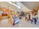 Open living and dining area with a large Christmas tree at 2801 S Granada Blvd, Kissimmee, FL 34746
