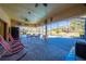 Screened pool area with patio furniture and open views at 2801 S Granada Blvd, Kissimmee, FL 34746