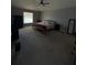 Large bedroom with a king-size bed and plenty of space at 308 Coventry Estates Blvd, Deltona, FL 32725
