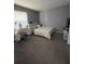 Bedroom with a full-size bed and a vanity area at 308 Coventry Estates Blvd, Deltona, FL 32725