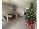 Dining area with light wood table and Christmas tree at 308 Coventry Estates Blvd, Deltona, FL 32725