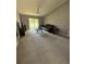 Living room with lake view and comfortable seating at 308 Coventry Estates Blvd, Deltona, FL 32725