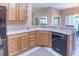 Kitchen features a corner sink and ample counter space at 334 Bell Tower Xing W, Poinciana, FL 34759