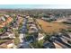 Aerial view of residential neighborhood with houses and landscape at 4191 Oaktree Drive, Davenport, FL 33837