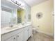 Double vanity bathroom with shower and tile flooring at 4191 Oaktree Drive, Davenport, FL 33837