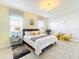 Bright bedroom with king-size bed and stylish decor at 4191 Oaktree Drive, Davenport, FL 33837