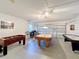 Game room featuring pool table and air hockey at 4191 Oaktree Drive, Davenport, FL 33837