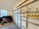 Garage with storage for sports equipment and bikes at 4191 Oaktree Drive, Davenport, FL 33837