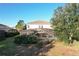 Two-story home with a private pool and screened enclosure at 4191 Oaktree Drive, Davenport, FL 33837