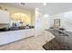 Modern kitchen with granite countertops and stainless steel appliances at 4191 Oaktree Drive, Davenport, FL 33837