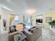 Spacious living area featuring comfortable seating and access to patio at 4191 Oaktree Drive, Davenport, FL 33837
