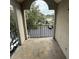 Balcony overlooking parking lot and lake at 4728 Walden Cir # 37, Orlando, FL 32811