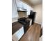 Modern kitchen with granite countertops and black appliances at 4728 Walden Cir # 37, Orlando, FL 32811