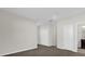 Spacious hallway with carpet and doors at 4858 Tribute Trl, Kissimmee, FL 34746