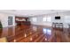 Community room with kitchen and hardwood floors at 4860 Conway Rd # 56, Orlando, FL 32812