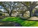Landscaped courtyard with benches and a fountain, offering a relaxing atmosphere at 4860 Conway Rd # 56, Orlando, FL 32812
