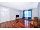 Light and airy entryway with hardwood floors and white door at 4860 Conway Rd # 56, Orlando, FL 32812