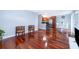 Open concept living room and kitchen with hardwood floors at 4860 Conway Rd # 56, Orlando, FL 32812