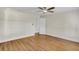 Simple bedroom with wood floors and ceiling fan at 4950 Nova Ave, St Cloud, FL 34773