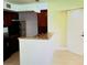 Kitchen features granite countertops and dark wood cabinets at 5124 Conroy Rd # 635, Orlando, FL 32811