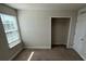 Bright bedroom with large window and spacious closet at 640 Spanish Pine Rd, Davenport, FL 33837