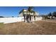 House front yard with driveway and landscaping at 640 Spanish Pine Rd, Davenport, FL 33837