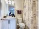 Clean bathroom with shower/tub combo and floral shower curtain at 681 San Joaquin Rd, Poinciana, FL 34759