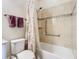Clean bathroom with shower/tub combo and floral shower curtain at 681 San Joaquin Rd, Poinciana, FL 34759