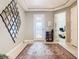 Bright entryway with decorative mirror and rug at 681 San Joaquin Rd, Poinciana, FL 34759