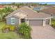 Beautiful home with tile roof and landscaped yard at 681 San Joaquin Rd, Poinciana, FL 34759