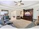 Comfortable living room with sectional sofa and TV at 681 San Joaquin Rd, Poinciana, FL 34759
