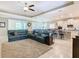 Spacious living room with sectional sofa and fireplace at 681 San Joaquin Rd, Poinciana, FL 34759