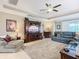 Living room featuring a large entertainment center at 681 San Joaquin Rd, Poinciana, FL 34759