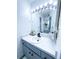 Updated bathroom vanity with modern fixtures at 72 Aspen Dr, Haines City, FL 33844