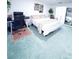 Bright bedroom featuring a king-size bed and workspace at 72 Aspen Dr, Haines City, FL 33844