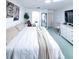 King-size bed, large dresser, and plenty of natural light at 72 Aspen Dr, Haines City, FL 33844