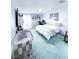 Main bedroom with king bed, dresser, and crib at 72 Aspen Dr, Haines City, FL 33844
