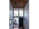 Bright entryway with high ceilings and large windows at 72 Aspen Dr, Haines City, FL 33844