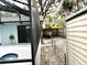 Home features a screened pool and spa with a storage shed at 916 S Park Ct, Kissimmee, FL 34741